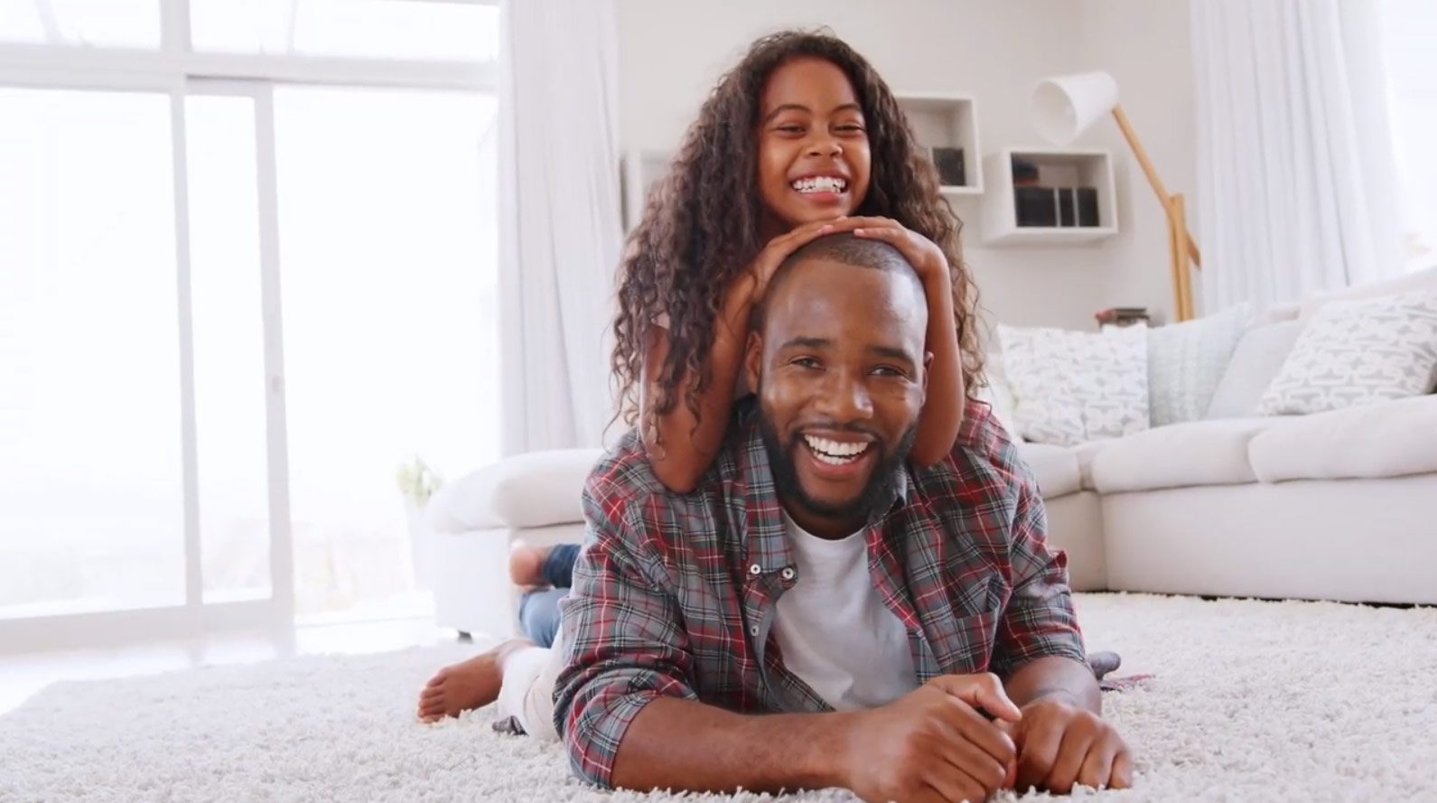 Daughter smiling with her father